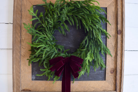 Faux Norfolk Pine Wreath with Velvet Bow