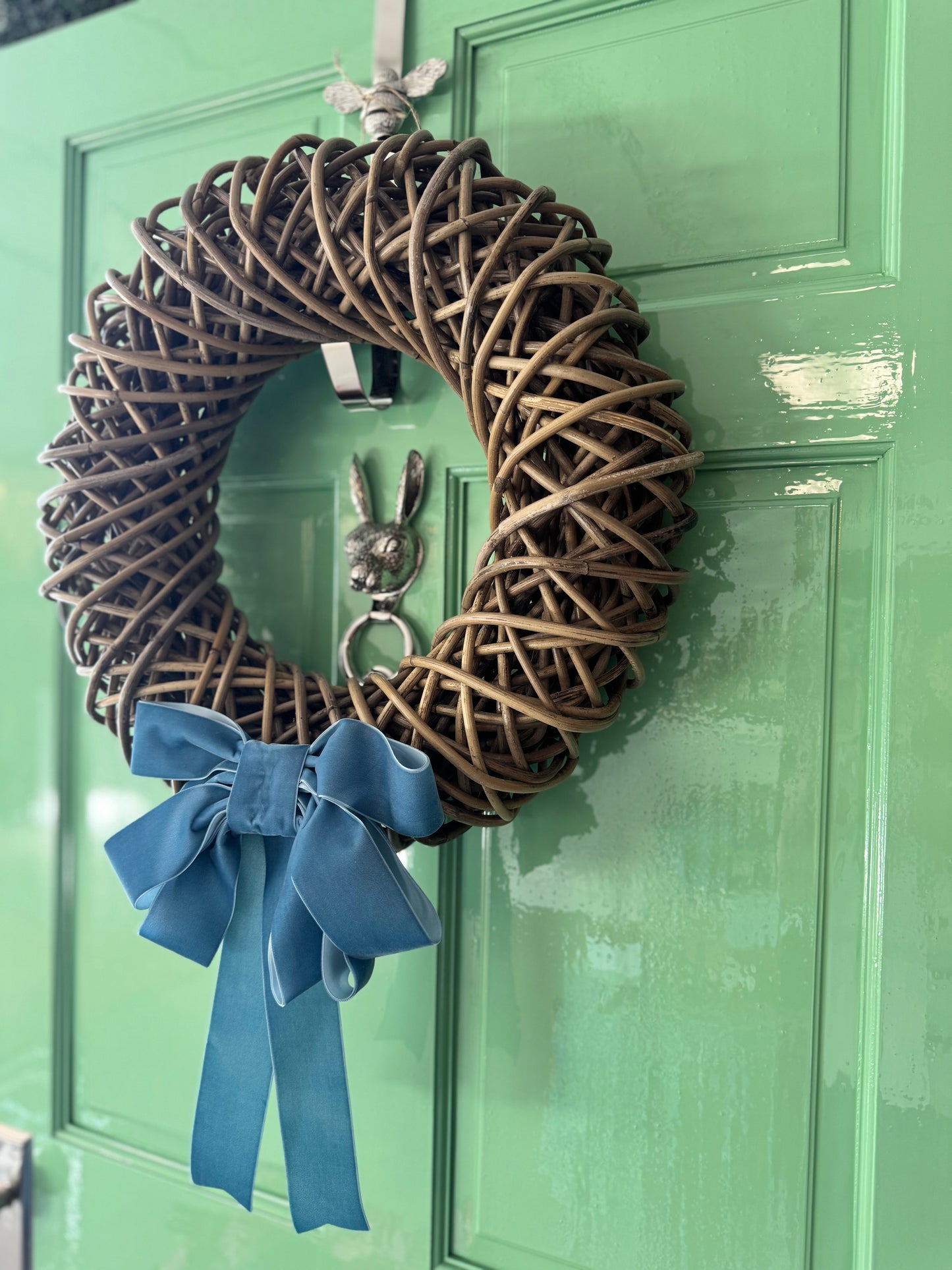 Wicker wreath with Blue Velvet Bow