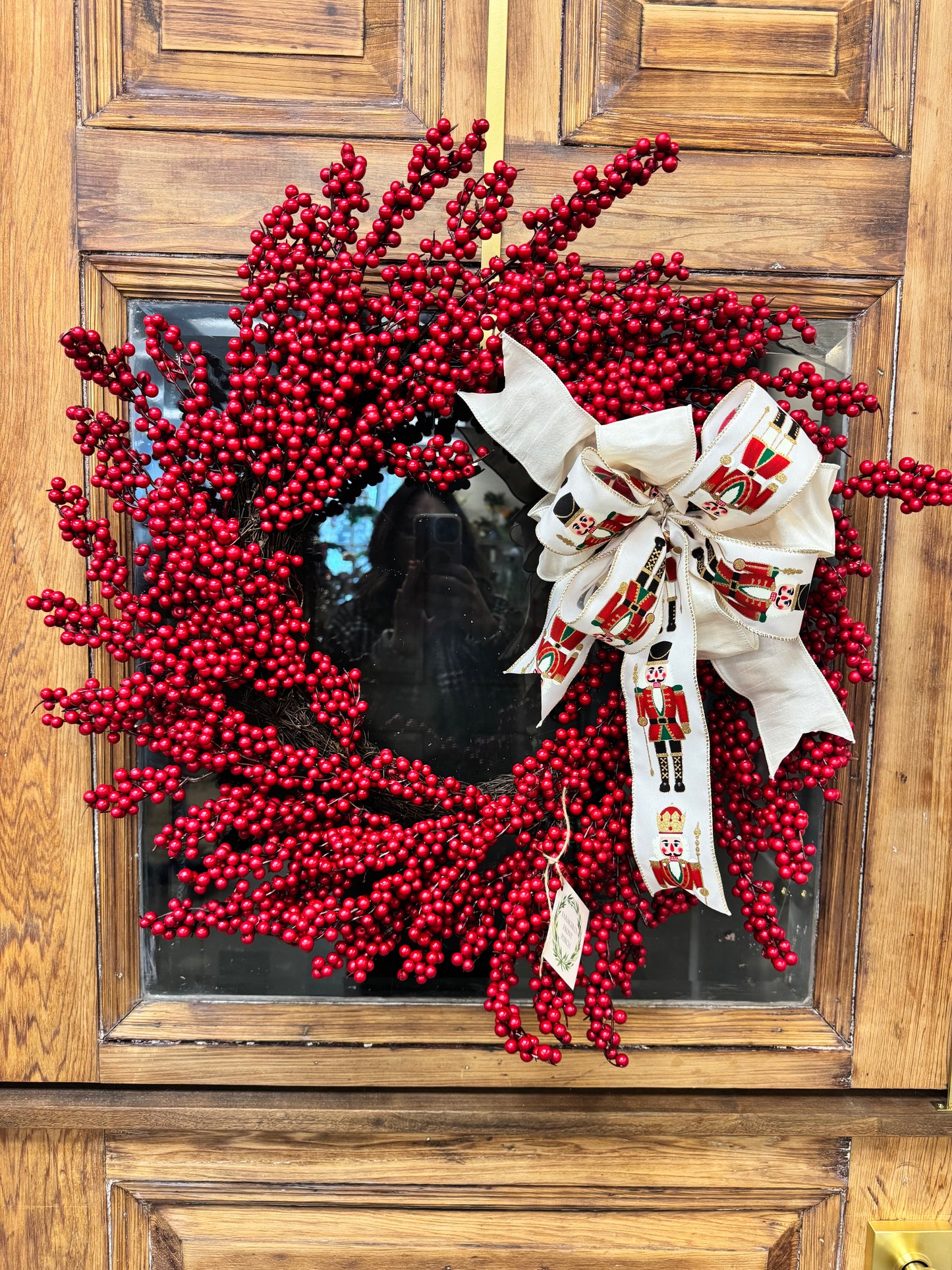Red Berry Wreath with Nutcracker Bow
