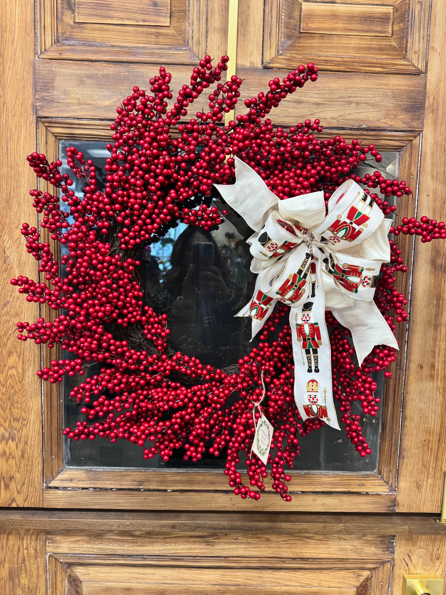 Red Berry Wreath with Nutcracker Bow