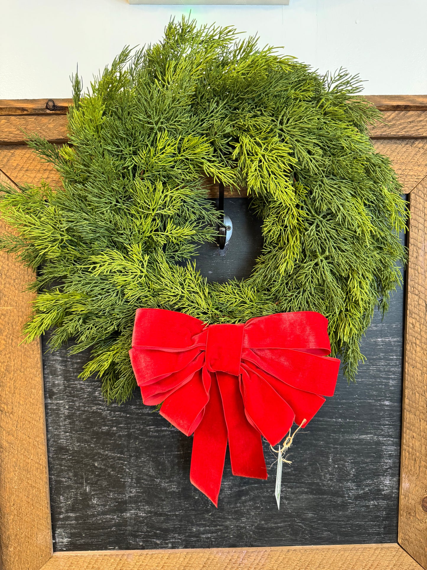 Faux Cedar wreath with red velevt bow
